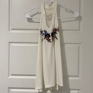High neck flowy tank top with floral embroidery